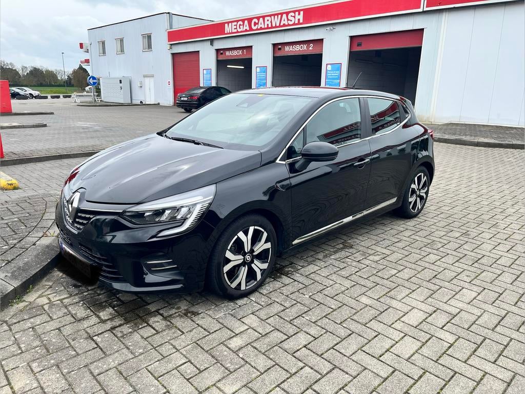 Renault Clio Intens Blue dCi 100, Auto's, Renault, Voorwielaandrijving, 4 cilinders, 110 g/km, Leder en Stof