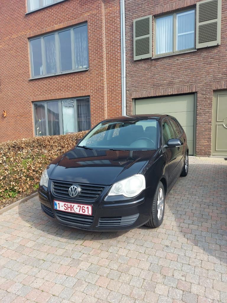 Volkswagen Polo 2006 1.2 benzine blanco gekeurd voor verkoop, Auto's, Volkswagen, Voorwielaandrijving, Stof, Zwart, Elektrische ramen