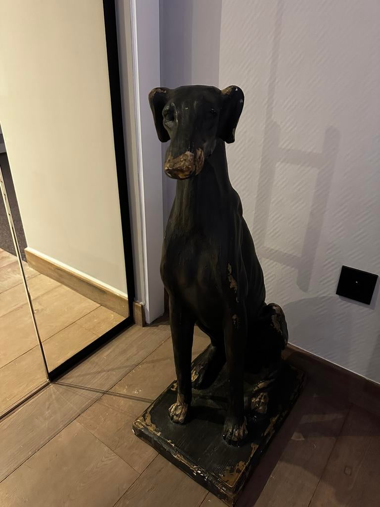 Beeld van een hond, Ophalen