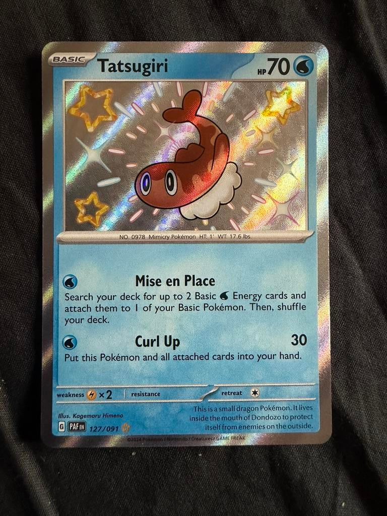Tatsugiri Baby Shiny (Paldean Fates), Hobby en Vrije tijd, Ophalen of Verzenden, Zo goed als nieuw, Losse kaart, Foil