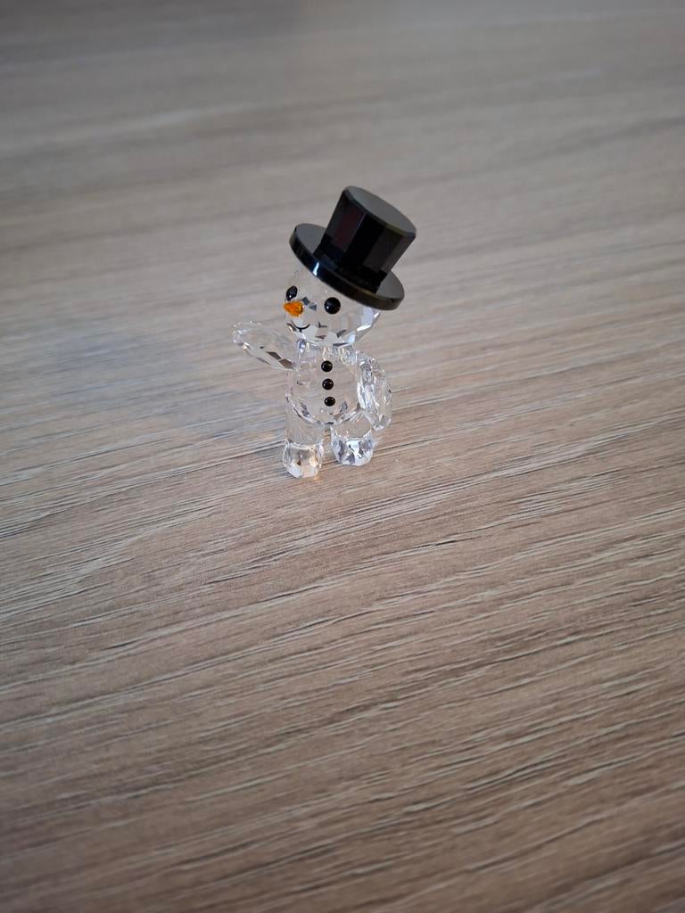 Swarovski kris beer: kersteditie 2015, Ophalen