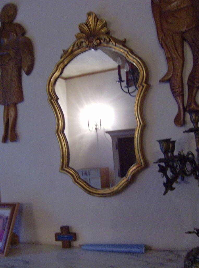 Kuifspiegel in vergulde lijst, Ophalen