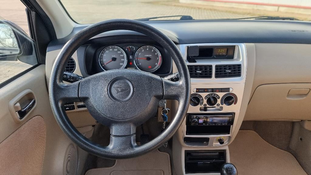 Daihatsu Cuore 1.0 laag km/keuringverkoop, Auto's, Daihatsu, Voorwielaandrijving, Stof, Beige, Cuore