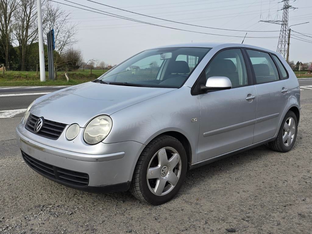 VOLKSWAGEN POLO 1400CC BENZINE 09/2004 180000KM MET AIRCO, Autos, Volkswagen, Argent ou Gris, Achat, Entreprise, Boîte manuelle