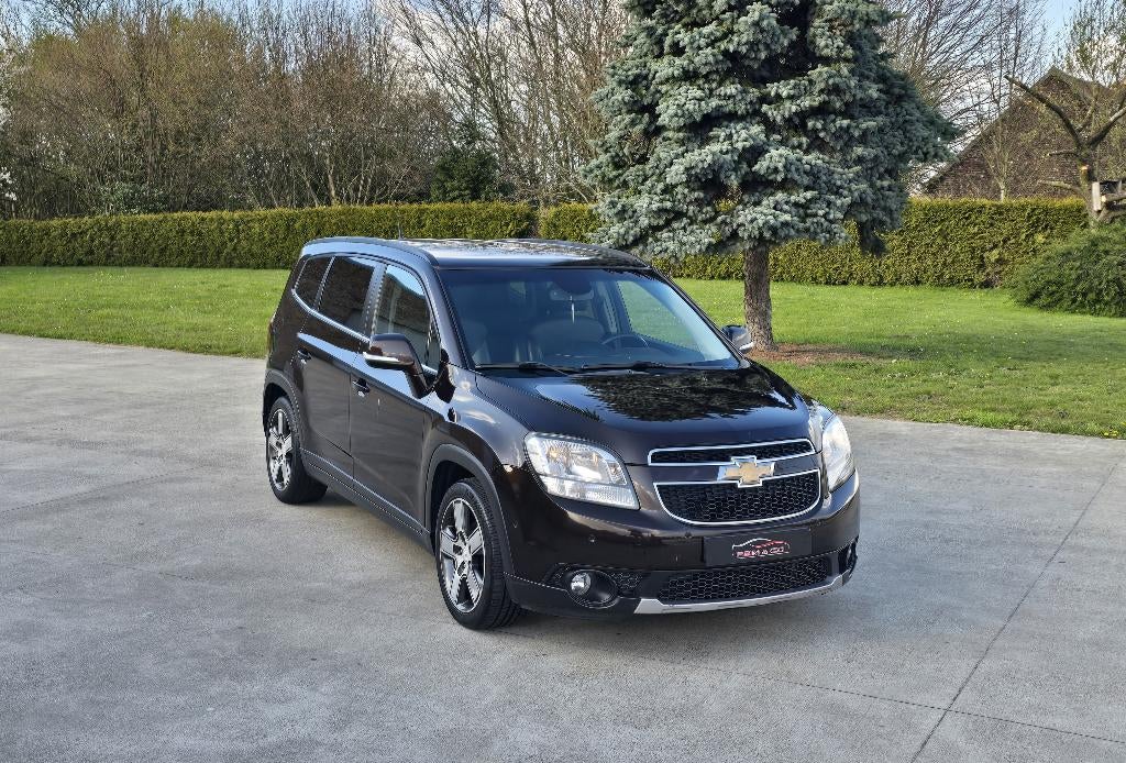 Chevrolet Orlando 1.4i Benz. ** 7 pl. - Camera ** GAR 12M, Auto's, Chevrolet, Voorwielaandrijving, Euro 5, Monovolume, Zwart
