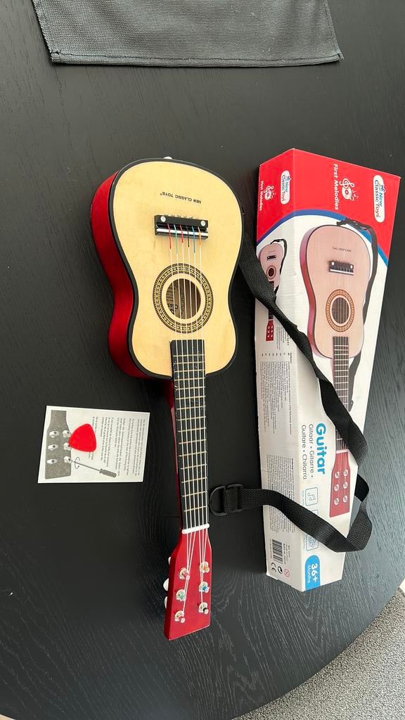 Speelgoedgitaar, Ophalen, Zo goed als nieuw