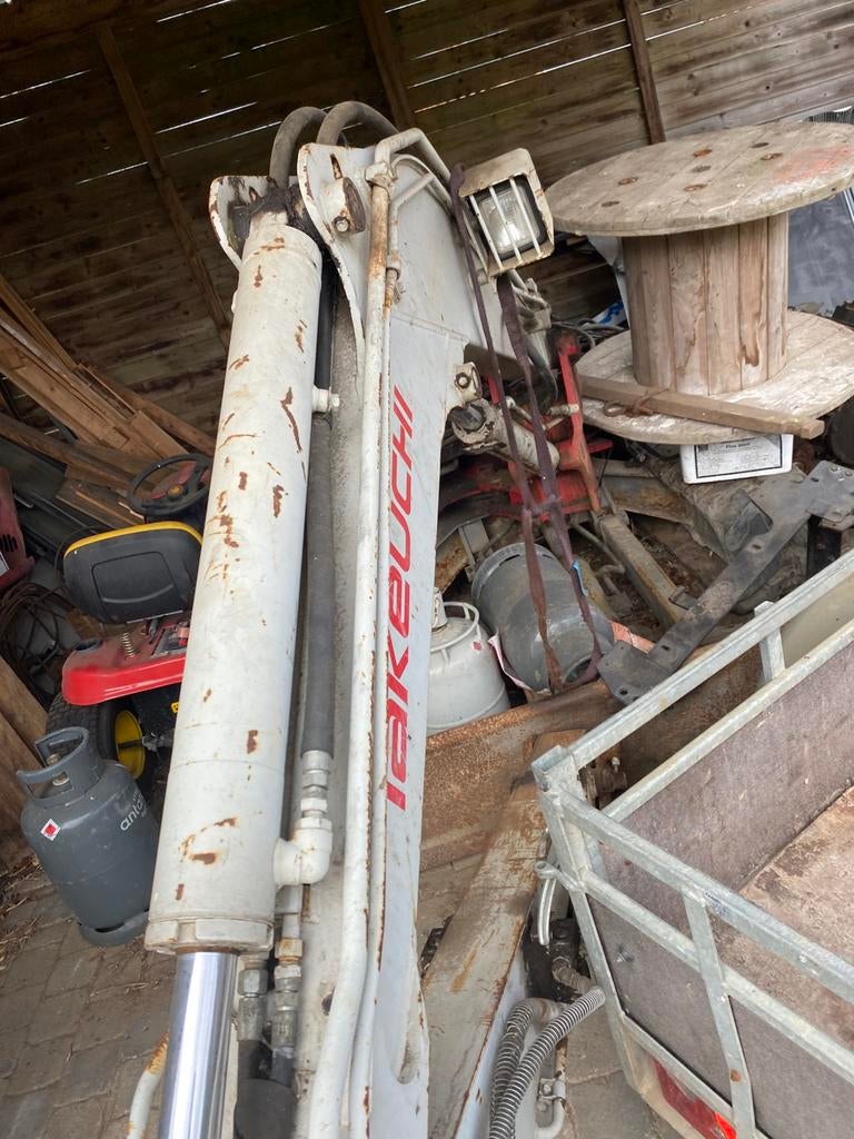 Graafmachine met brandschade, Ophalen