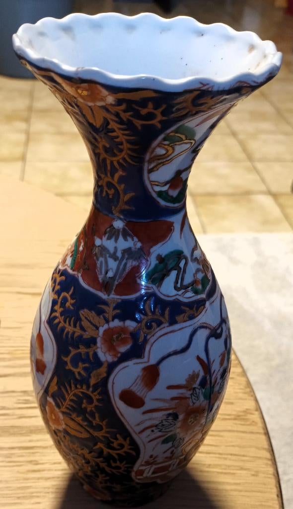 koppel getekende kartel-vaasjes in Imari, Ophalen