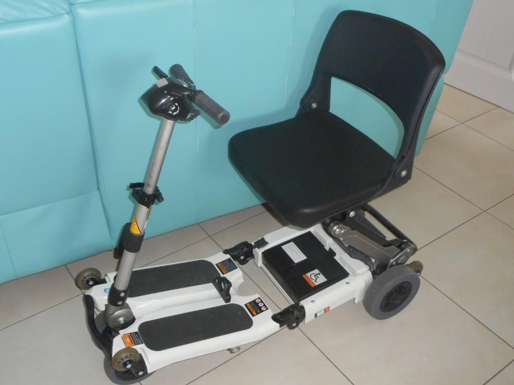 Voiturette électrique pliable, Divers, Chaises roulantes, Enlèvement, Pliant, Comme neuf, Fauteuil roulant électrique