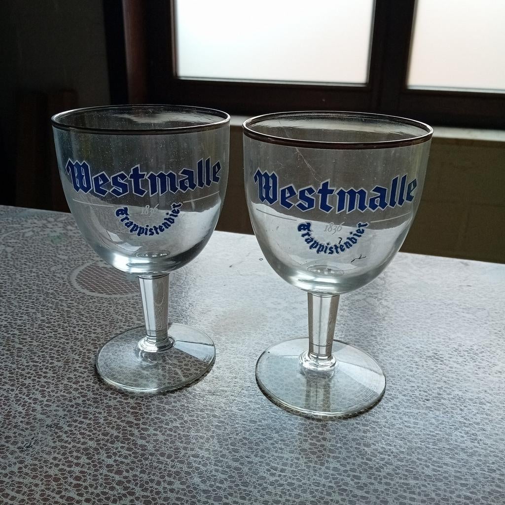 11 glazen Westmalle blauwe letters, Ophalen of Verzenden, Zo goed als nieuw