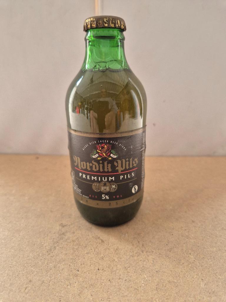 Bouteille de bière Nordik Pils (modèle 2), Collections, Enlèvement ou Envoi, Utilisé, Bouteille(s), Autres marques