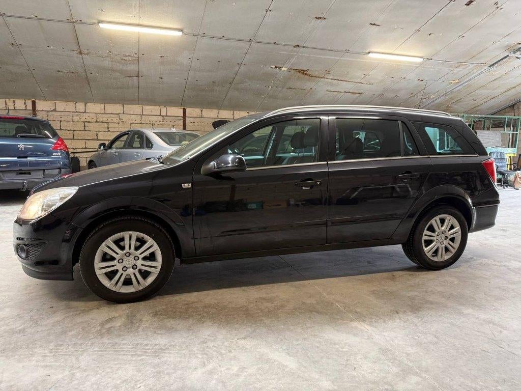 Opel Astra Cosmo 1.3 diesel, 1ste eigenaar,, Auto's, Opel, Voorwielaandrijving, Zwart, 4 cilinders, Leder en Stof