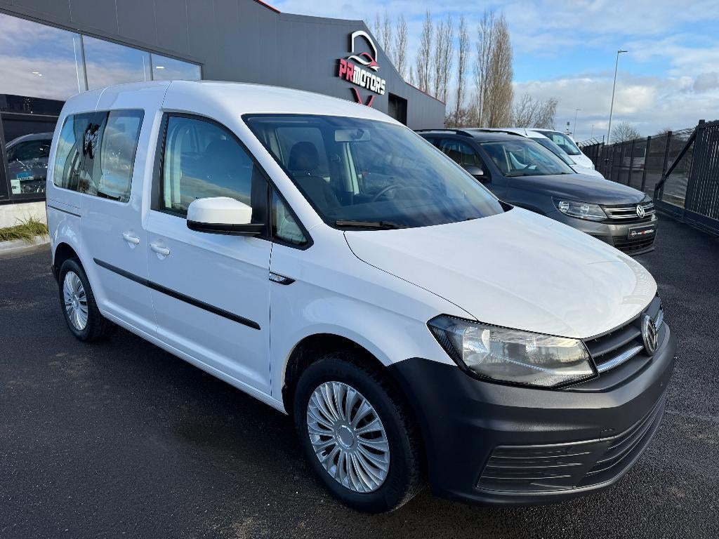 Volkswagen Caddy 5pl 1.4 benzine 1st eigenaar ohboek, Voorwielaandrijving, 4 cilinders, Wit, 5 deurs