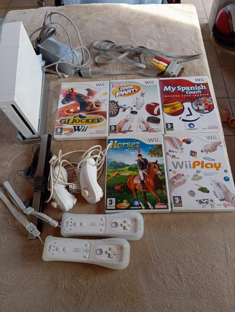 WII + games + controllers