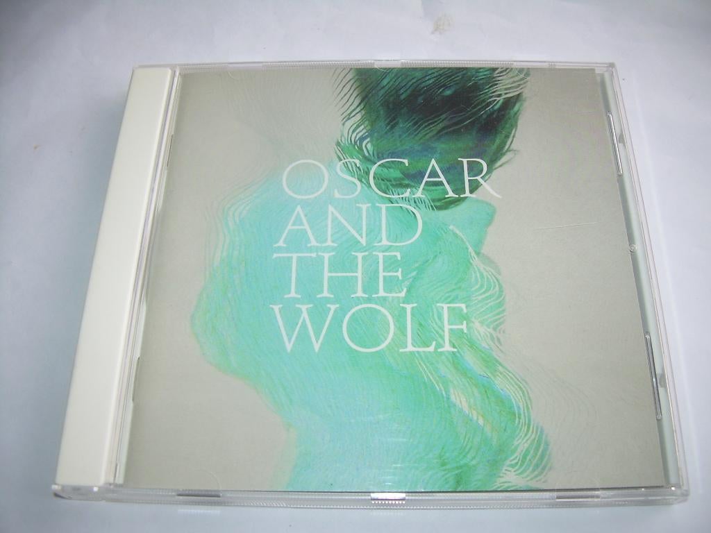 CD - OSCAR AND THE WOLF, Ophalen of Verzenden, Zo goed als nieuw