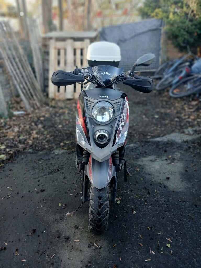 Sym crox B klasse met papieren, Ophalen