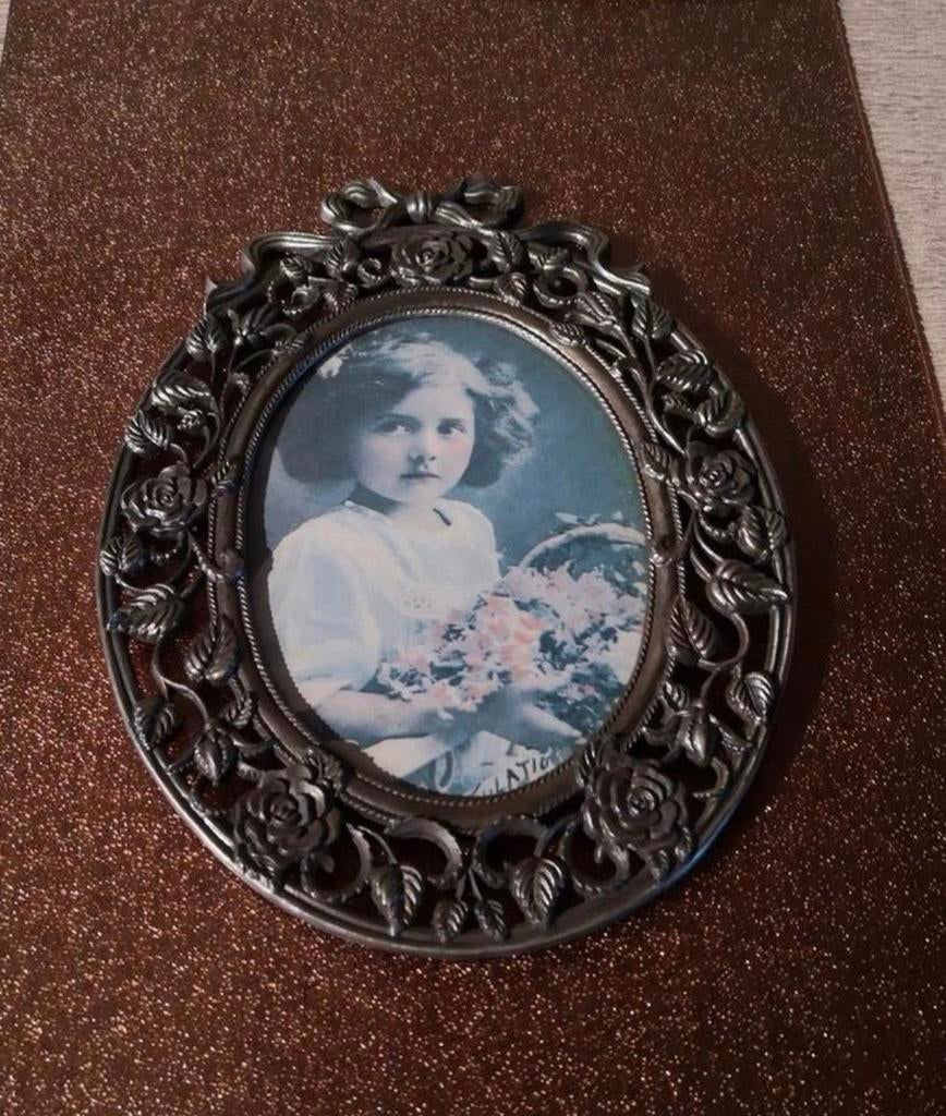 Mooi metalen uitgesneden kadertje, Ophalen