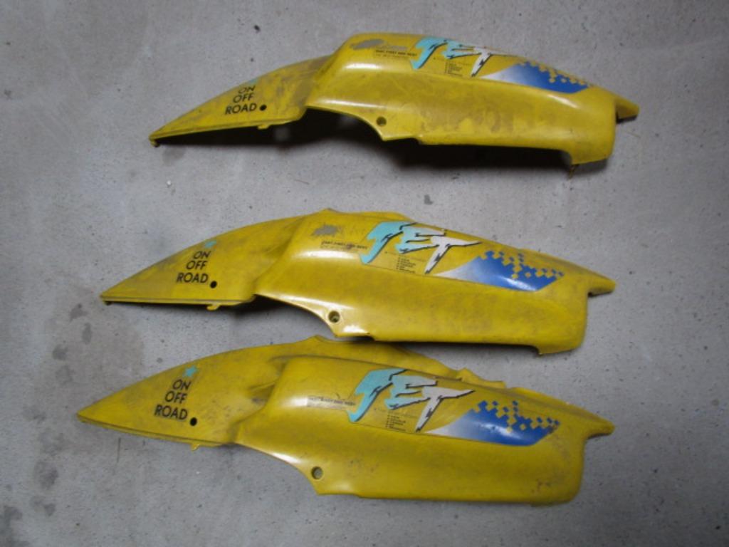 3 housses latérales gauche d'occasion scooter SYM Jet 50cc, Enlèvement ou Envoi, Utilisé, Capot, SYM