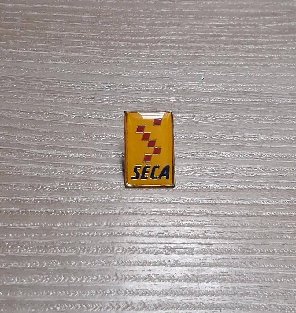 PIN - SECA, Collections, Enlèvement ou Envoi, Utilisé, Autres sujets/thèmes, Insigne ou Pin's