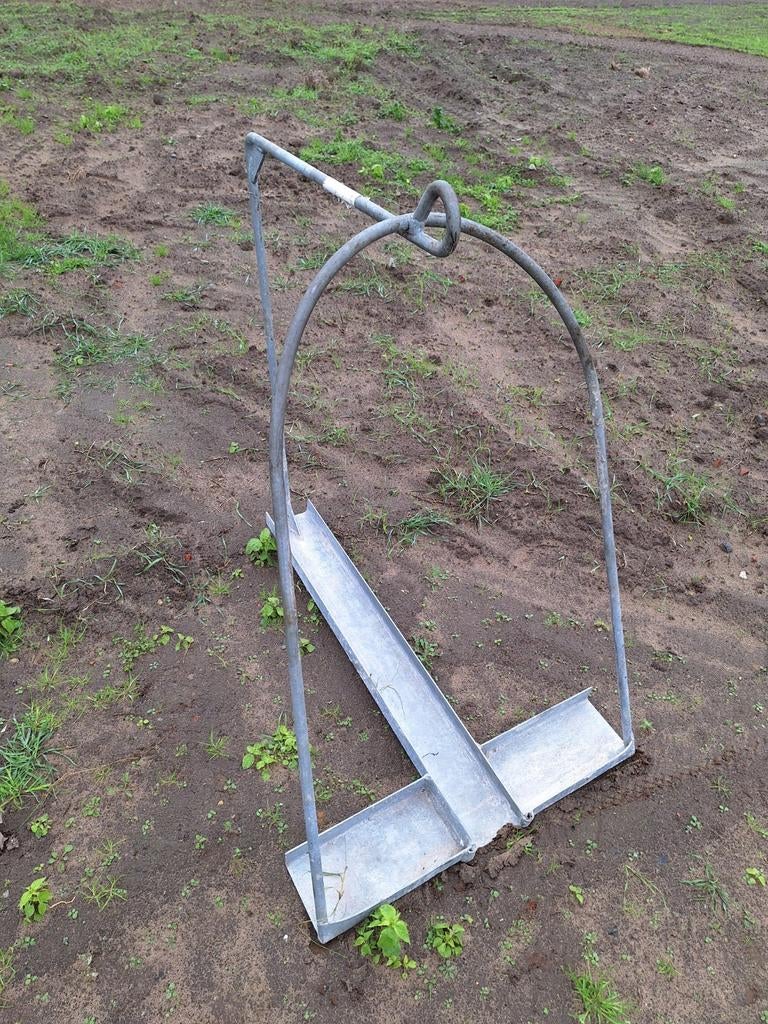 Kruiwagenstoel galvanise, Ophalen