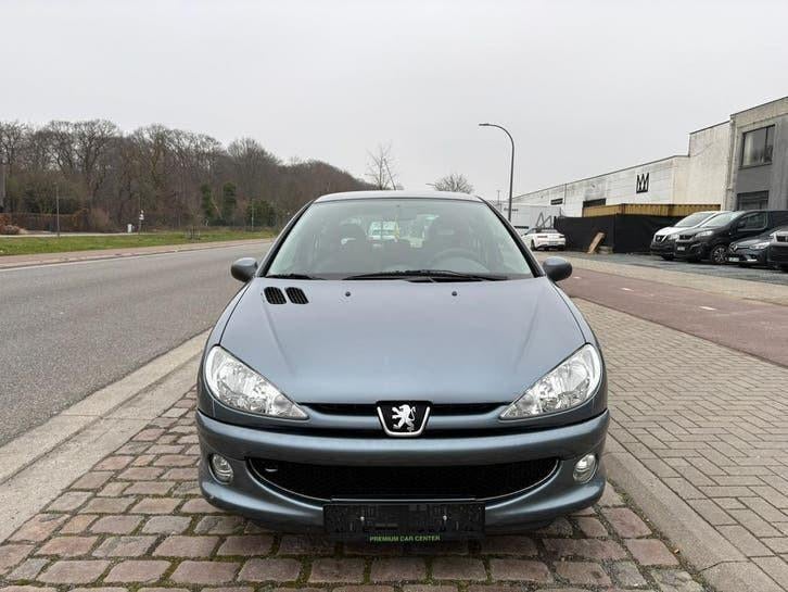 Peugeot 206 | 12 Maanden Garantie | 99Dkm | Benzine | 2006 |, Auto's, Voorwielaandrijving, Testrit aan huis, Stof, 1360 cc
