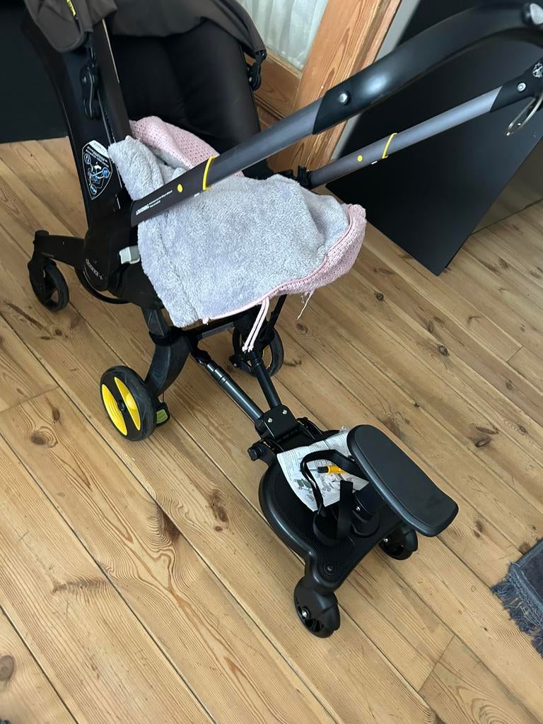 Doona met verkleurde kap door de zon, Kinderen en Baby's, Ophalen