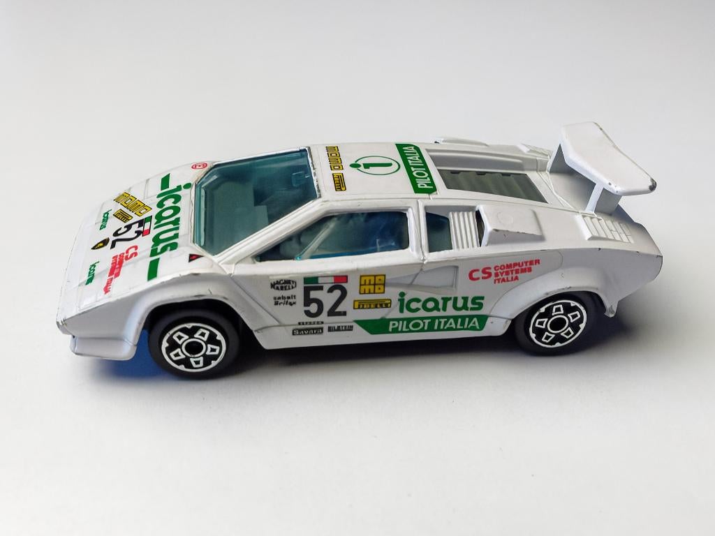 Lamborghini Countach 5000S Burago 1/43 Pilot Italie, Hobby & Loisirs créatifs, Enlèvement ou Envoi, Utilisé, Voiture, Autres marques