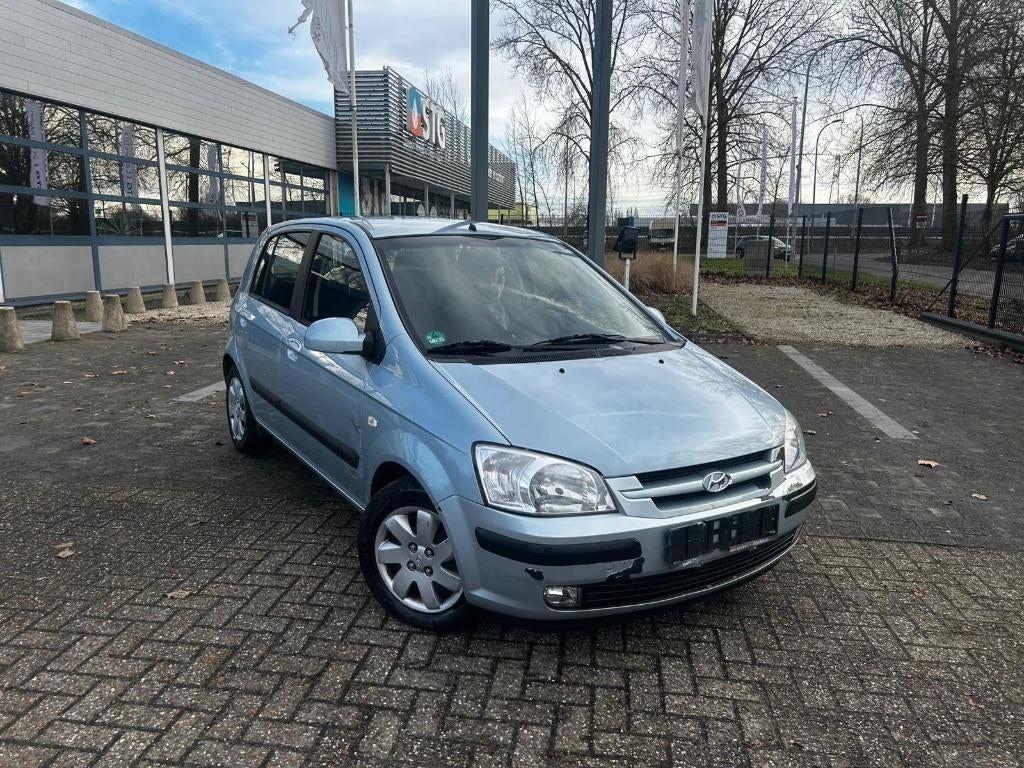 Hyundai Getz benzine met keurig verkoop, Auto's, Hyundai, Voorwielaandrijving, 4 deurs, Zwart, 4 cilinders