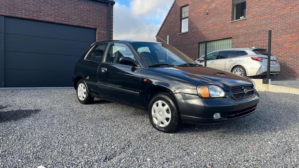 Suzuki Baleno 1.3 benzine, 57.000 kilometres, 2004 bouwjaar, Auto's, Suzuki, 63 kW, Baleno, Zwart, Bedrijf