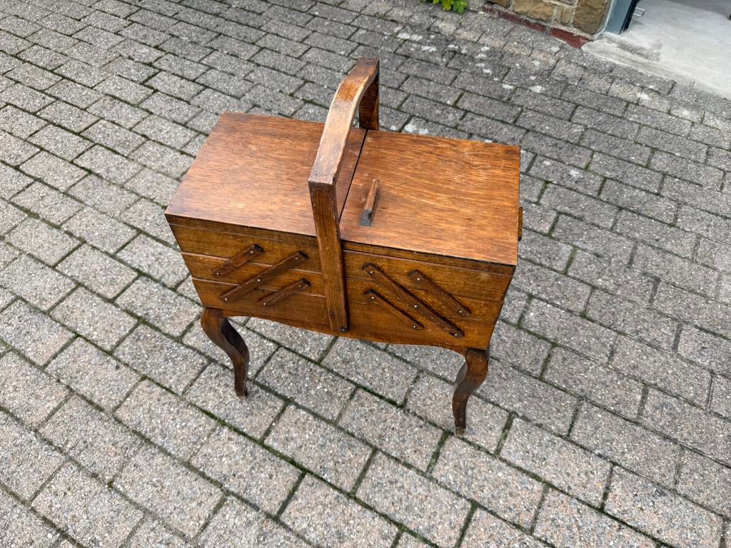 houten naaidoos, Ophalen