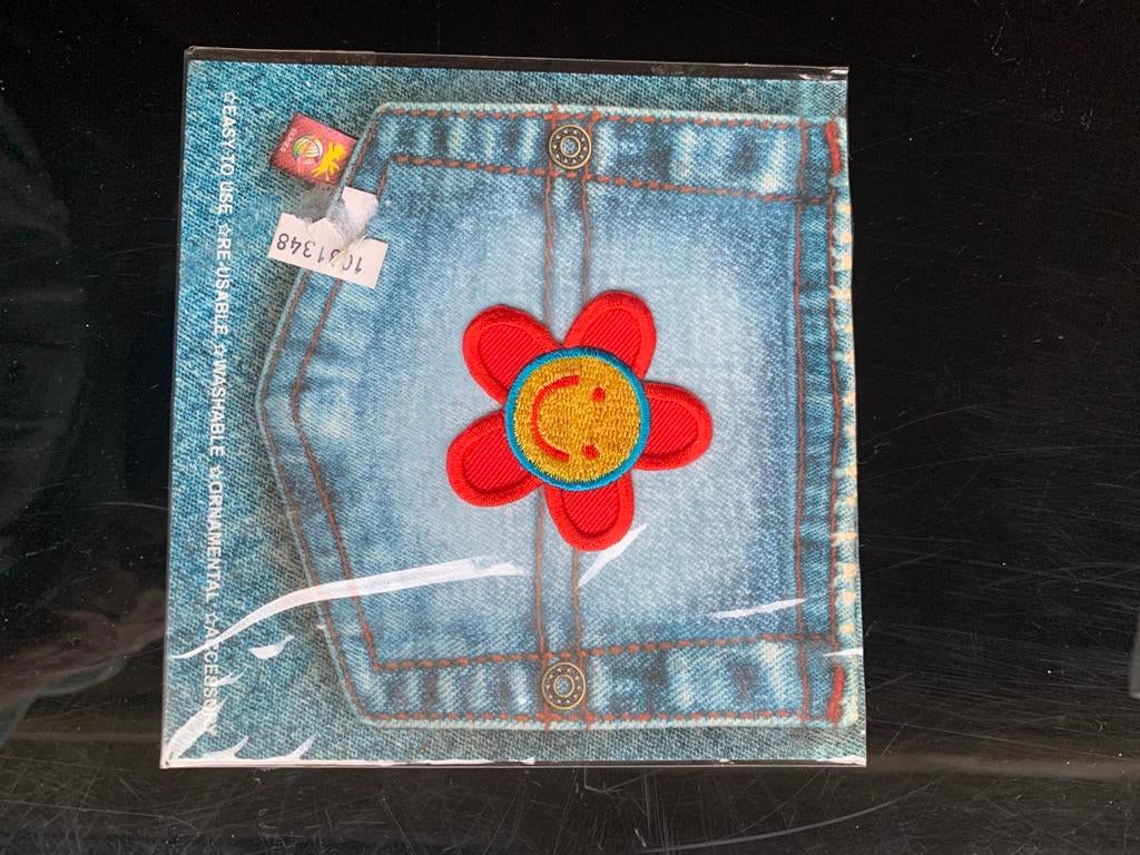 rood zonnetje of lachende bloem strijkapplicatie, Ophalen