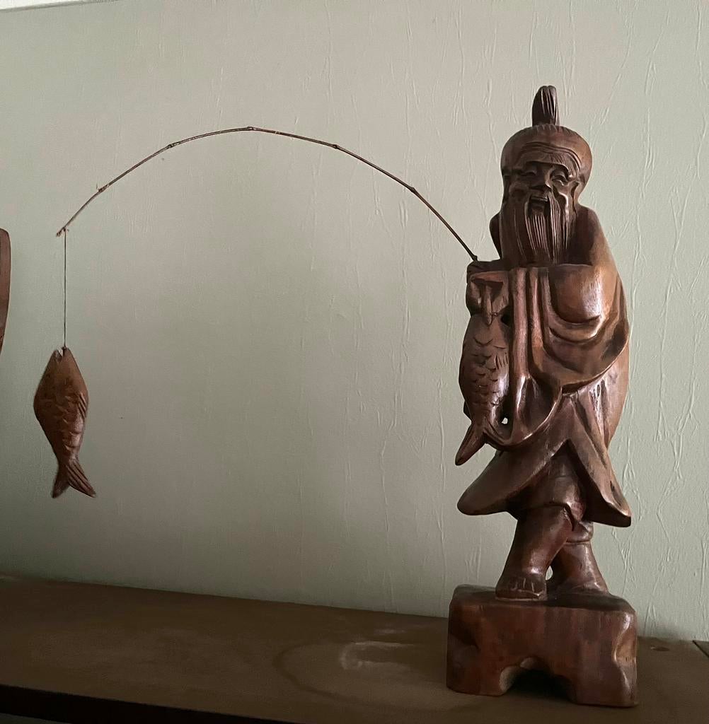 Beeld visser Azië, Ophalen