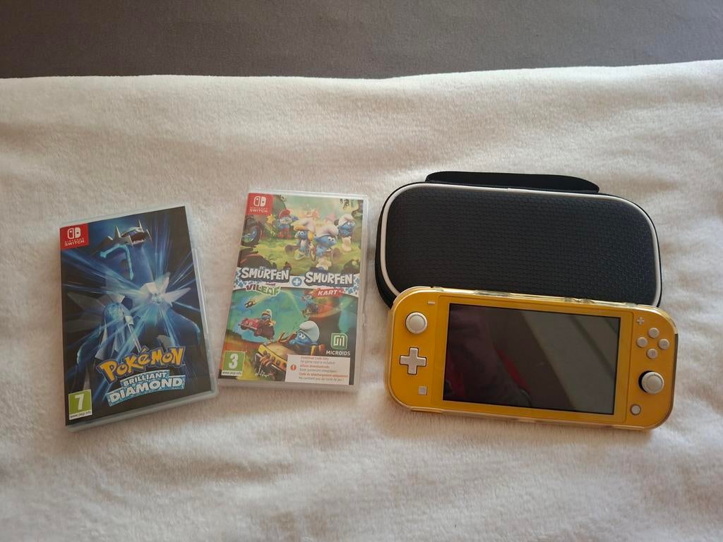 Nintendo switch lite 2 games en hoes, Games en Spelcomputers, Spelcomputers | Nintendo Switch Lite, Ophalen