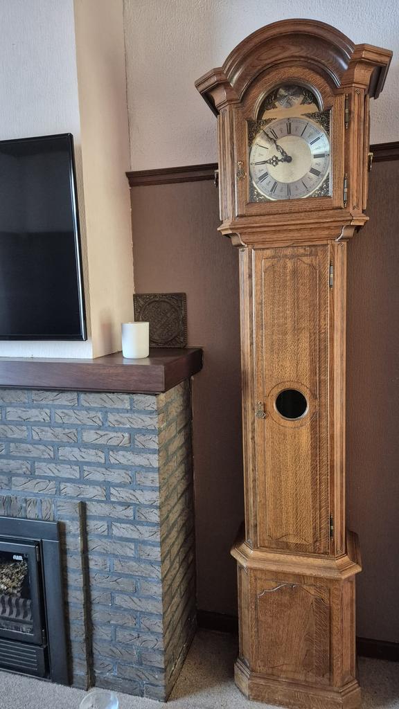 Horloge sur pied en bois, Enlèvement