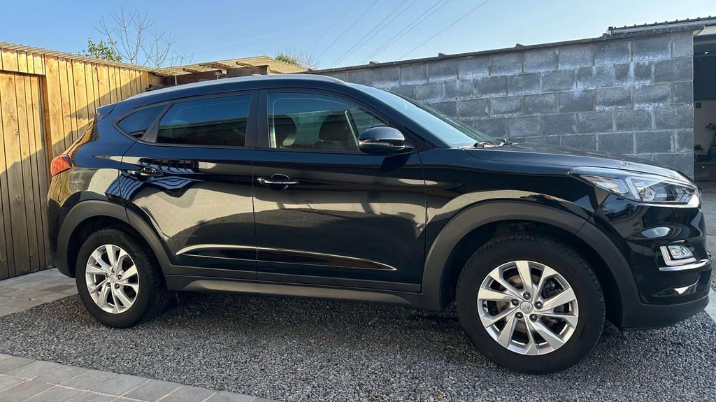 Hyundai Tucson 1.6 GDi Feel Comfort Pack Led Navi Camera BT, Auto's, Hyundai, Voorwielaandrijving, Stof, Gebruikt, Zwart