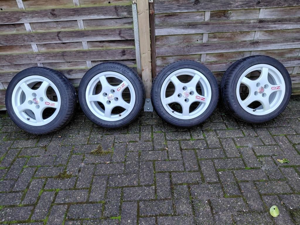 4 witte OZ Rally-Racing velgen 7JR15H2 met 4 nieuwe banden ., Auto-onderdelen, Banden en Velgen, Band(en), Ophalen