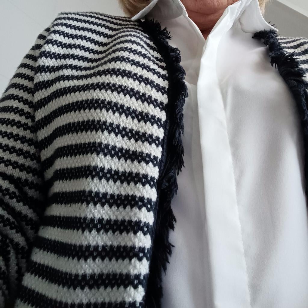 Vest met franjes, Ophalen