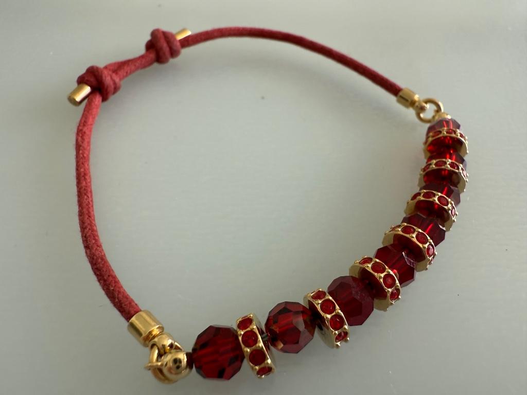 Nieuwe Swarovski armband rood kristal/goudkleur gratis verz., Handtassen en Accessoires, Armbanden, Met kristal, Overige materialen