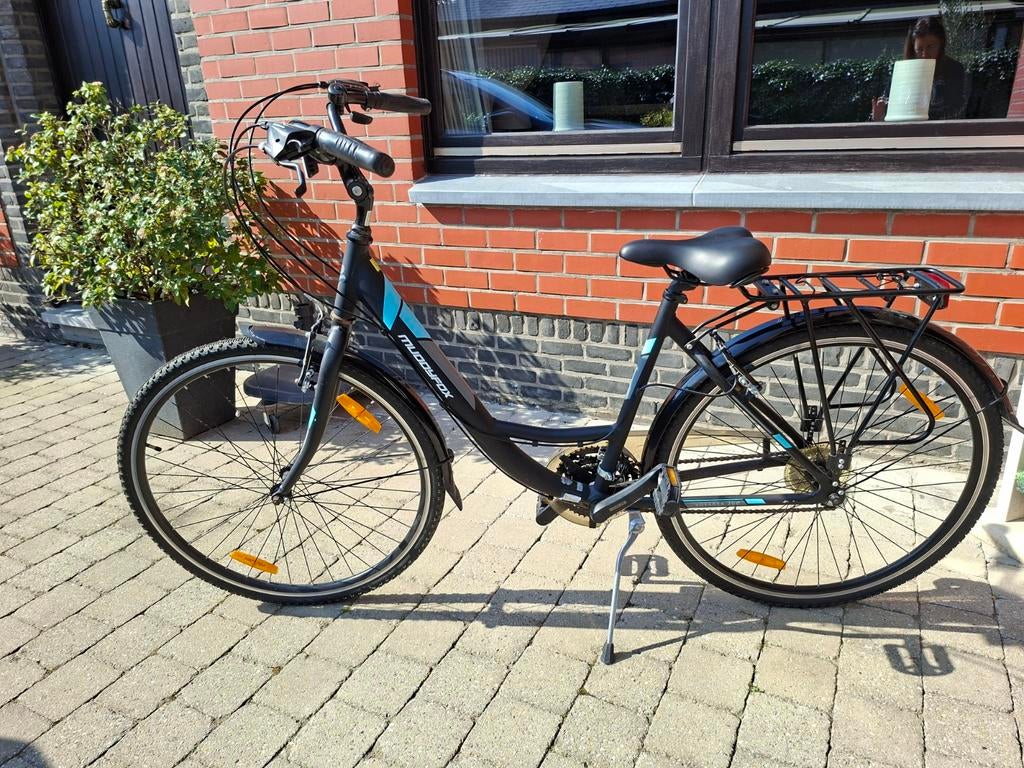 Zwarte damesfiets Muddyfox met 7 versnellingen van Shimano, Ophalen, Zo goed als nieuw, Overige merken, Versnellingen
