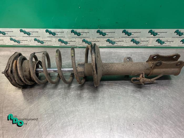 Schokdemperpoot links-achter van een Toyota Corolla (Corolla, Gebruikt, -, -, Ophalen of Verzenden