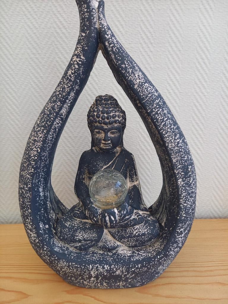 Decoratief tuinbeeld (boedha), Enlèvement