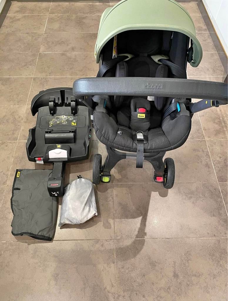 Doona i desert green + i-Size isofix base, Autres marques, Avec siège auto, Enlèvement, Utilisé