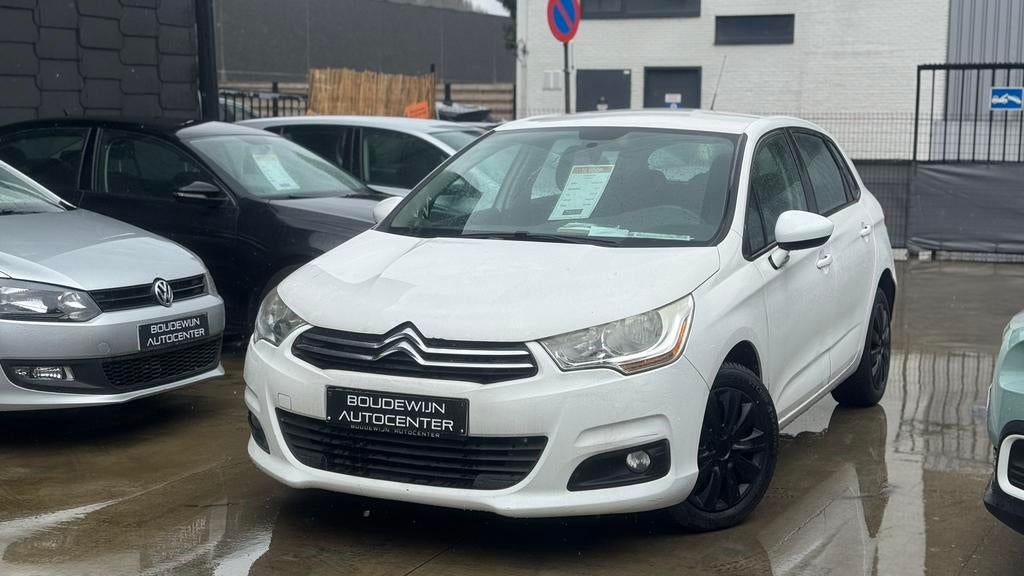 Citroën C4 1.4Benzine 2012 151.xxxkm/Airco,Cruisecontol, Auto's, Voorwielaandrijving, Stof, Zwart, Wit