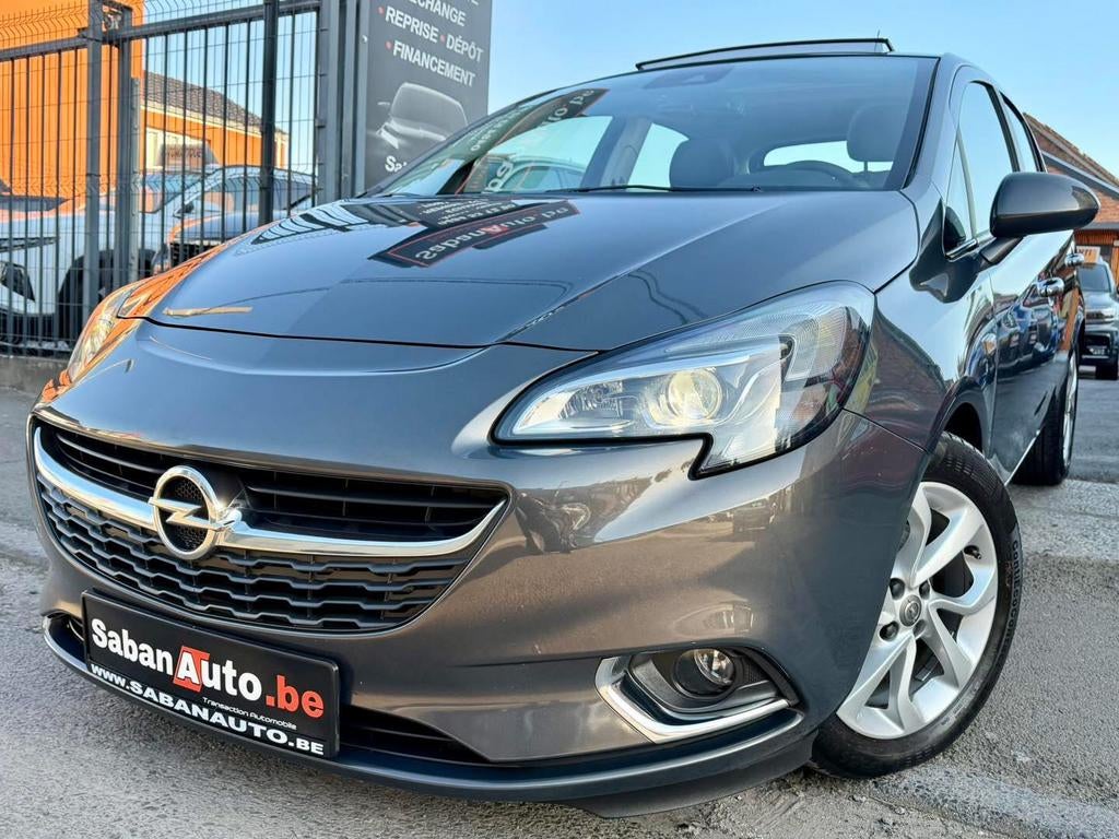 Opel Corsa E 1.0 Turbo Essence Cosmo 2015, Auto's, Euro 6, Bedrijf, 5 deurs, Zilver of Grijs