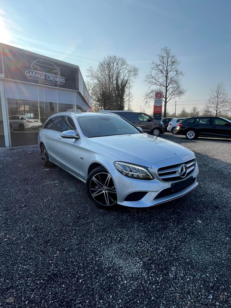 1 JAAR GARANTIE Mercedes C300de  PHEV 143kw T-9 Tronic Braek, Auto's, Automaat, Achterwielaandrijving, 4 cilinders, Leder en Stof