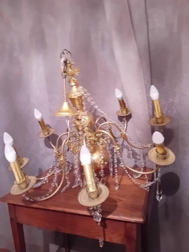 lustre Marie Thérèse recouvert à la feuille d'or, Enlèvement