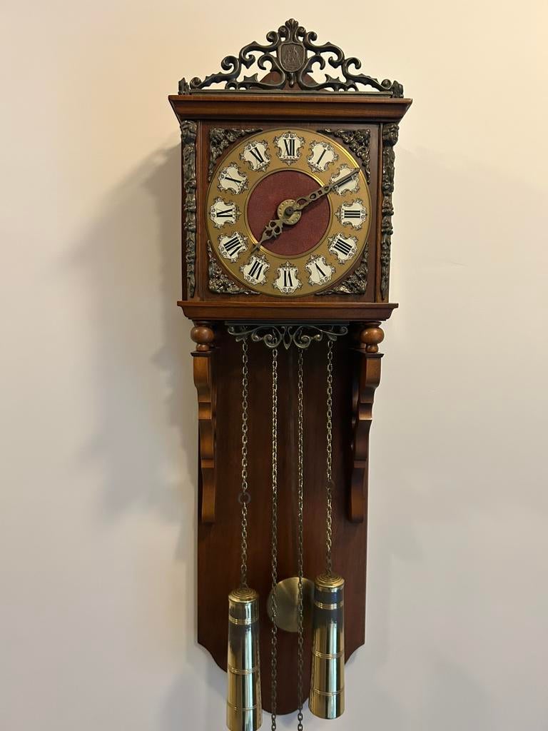 Antieke wandklok, Ophalen