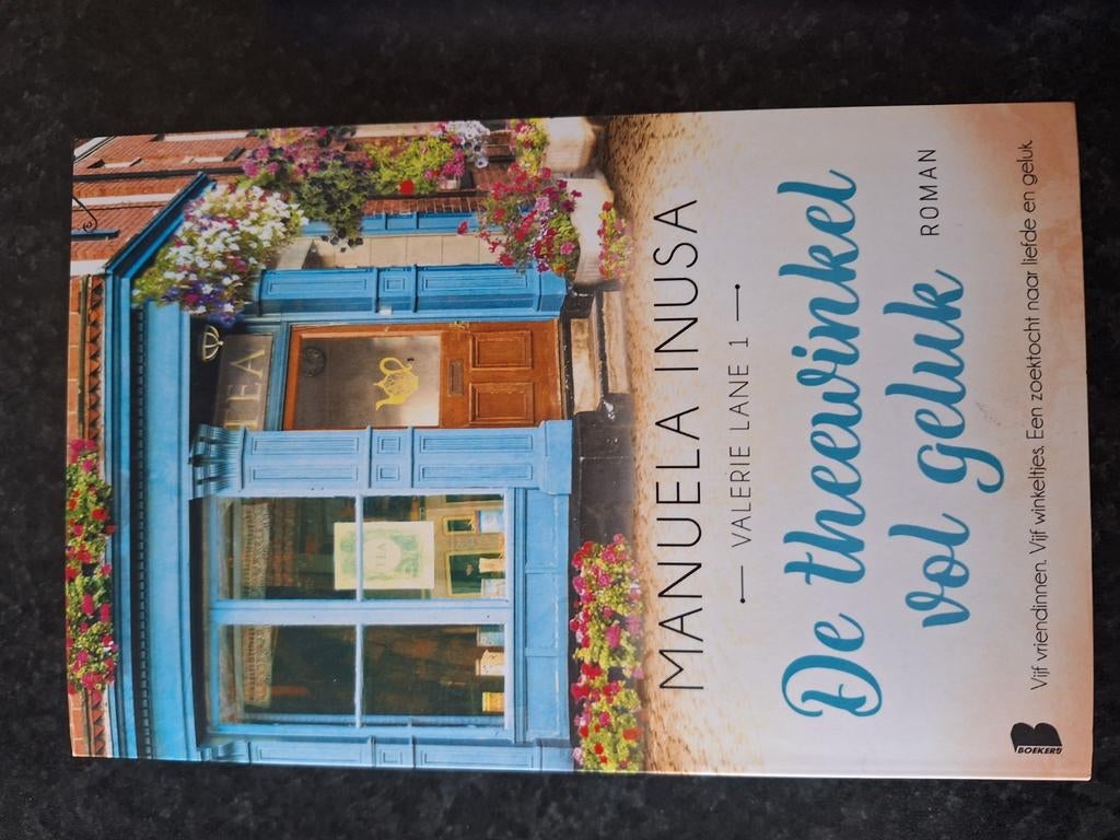 De theewinkel vol geluk van Manuela Inusa, Ophalen, Zo goed als nieuw