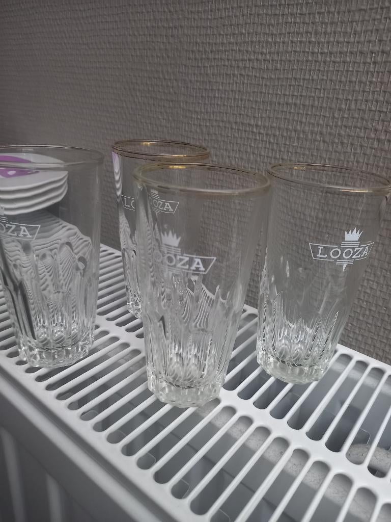 4 looza fruitsapglazen., Huis en Inrichting, Keuken | Servies, Ophalen of Verzenden, Gebruikt, Glas, Glas of Glazen