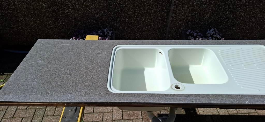 Évier double, Enlèvement